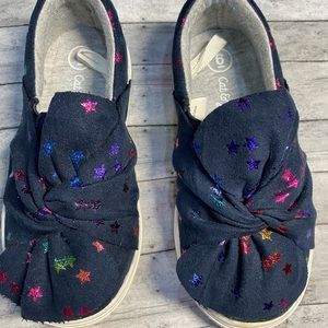 Toddler girl size 6 slip on shoe, navy blue and multi color stars.
